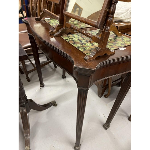 58 - 19th cent. Mahogany fold over top card table, the serpentine top on fluted legs terminating in block... 