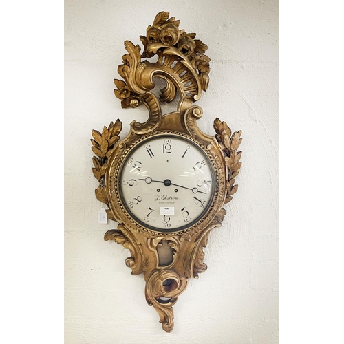 1040 - A Swedish rococo carved gilt wood cartel clock, the 10 in painted convex dial inscribed 'J Ekstrom, ... 