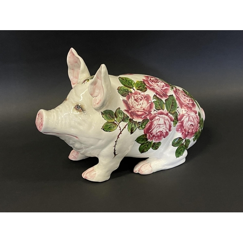 1004 - A Large Wemyss Pig, 20th century decorated with large overblown pink cabbage roses signed 'wemyss ex... 