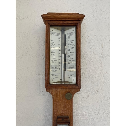 1253 - Fine antique English oak cased stick barometer, by Negretti and Zambre makers to her Majesty. Hatton... 