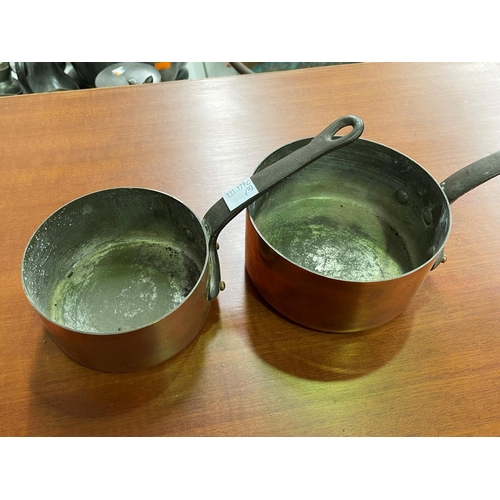 15 - Two French copper saucepans, with iron handles, approx 14cm Dia (ex handles) and smaller (2)