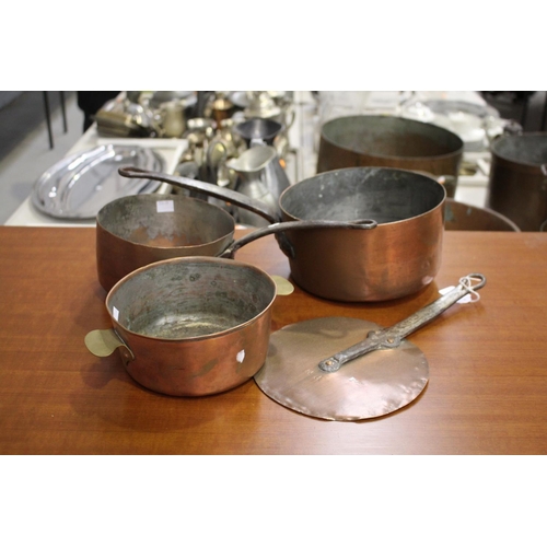 20 - Lot of French copper to include two saucepans, twin handled saucepan, and a lid marked P M, approx 2... 