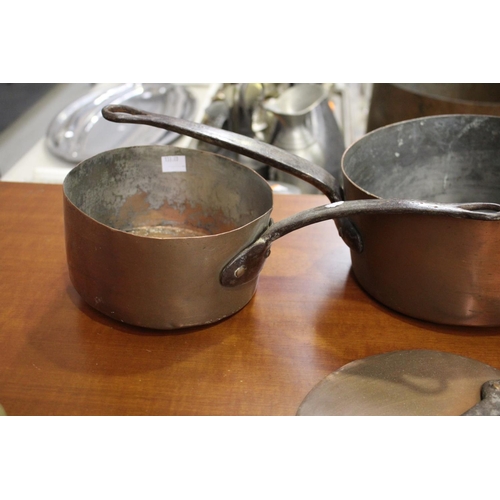 20 - Lot of French copper to include two saucepans, twin handled saucepan, and a lid marked P M, approx 2... 