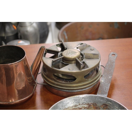 34 - Assortment of copper and brass items to include portable burner, pan, two lids and teapot (missing l... 