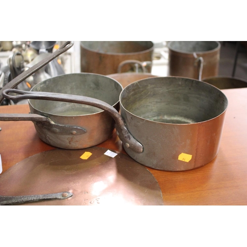 35 - Lot of three French copper saucepans with large copper lid, approx 31cm Dia and smaller (ex handles)... 