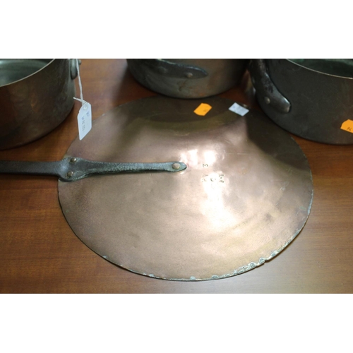 35 - Lot of three French copper saucepans with large copper lid, approx 31cm Dia and smaller (ex handles)... 