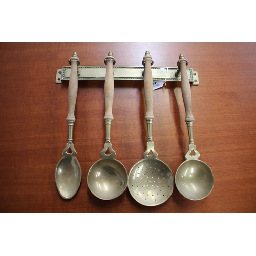 French kitchen utensils with turned wood handles, with rack, approx 37cm W