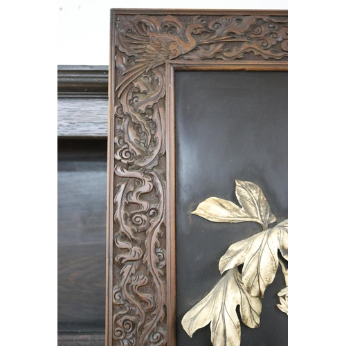 104 - Rare antique Meiji period Japanese ebonized panel with carved ivory in high relief of peonies, butte... 