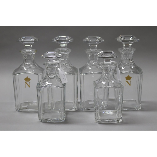 106 - Set of six Baccarat crystal decanters, four large and two smaller examples, (one large decanter has ... 