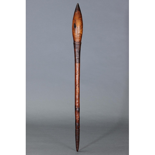 3 - FINE EARLY INCISED BULBOUS CLUB, VICTORIA, Carved and engraved hardwood (no custom stand) This is an... 