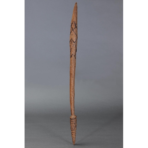 24 - EARLY INCISED THROWING CLUB, VICTORIA, Carved and engraved hardwood (with custom stand) Approx L59 x... 