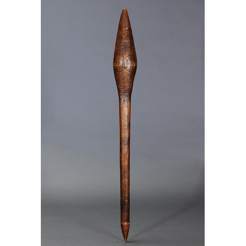 26 - EARLY ELONGATED BULBOUS CLUB, VICTORIA, Carved and engraved hardwood (with custom stand) Elongated b... 