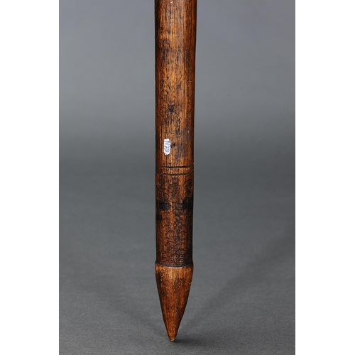 26 - EARLY ELONGATED BULBOUS CLUB, VICTORIA, Carved and engraved hardwood (with custom stand) Elongated b... 