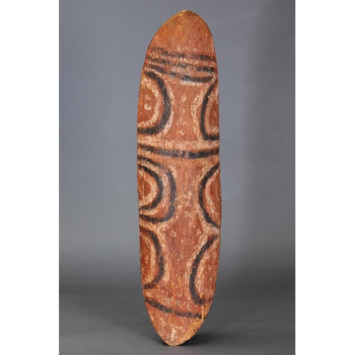 39 - PAINTED CENTRAL AUSTRALIAN COOLAMON, NORTHERN TERRITORY, Carved wood and natural pigment (with custo... 