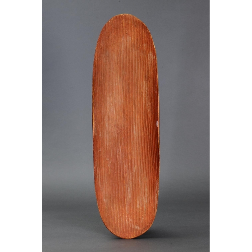 42 - CENTRAL AUSTRALIAN COOLAMON, NORTHERN TERRITORY, Carved and engraved wood and natural pigment (with ... 