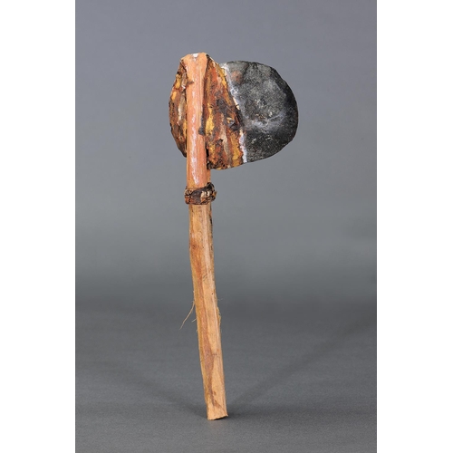 54 - EARLY STONE HAFTED AXE, ARNHEM LAND, NORTHERN TERRITORY, Carved stone, bent wood, spinifex resin and... 
