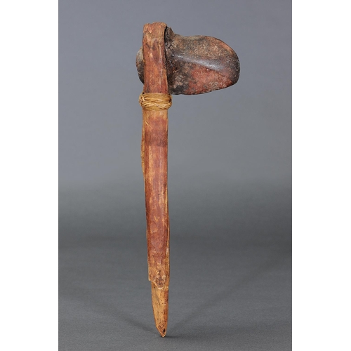 55 - EARLY STONE HAFTED AXE, CENTRAL AUSTRALIA, Carved stone, bent wood, spinifex resin and natural pigme... 