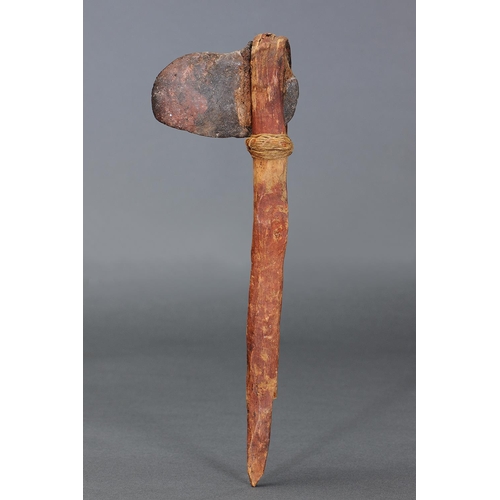 55 - EARLY STONE HAFTED AXE, CENTRAL AUSTRALIA, Carved stone, bent wood, spinifex resin and natural pigme... 