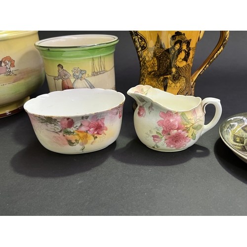 33 - Assortment of Royal Doulton to include vases, jug, bowl, creamer, sugar, etc,  Morrisian , Dutch Har... 