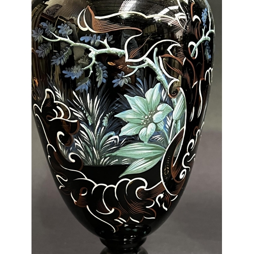 43 - Pair of antique black glass baluster shape vases, raised enamel decoration, each approx 30cm H (2)