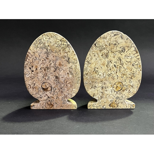 54 - Pair of bookends in the form of a egg, each approx 18cm H