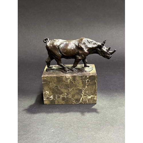 56 - Bronze Rhinoceros on marble base signed Bowee???, approx 15cm H including base x 12cm W