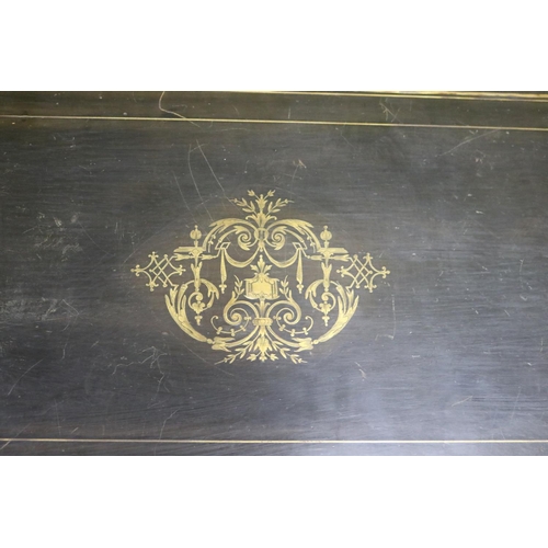 44 - Antique Napoleon III style games table, ebonized with brass inlaid decoration. Standing on turned fl... 