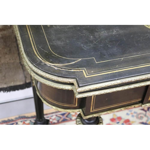 44 - Antique Napoleon III style games table, ebonized with brass inlaid decoration. Standing on turned fl... 