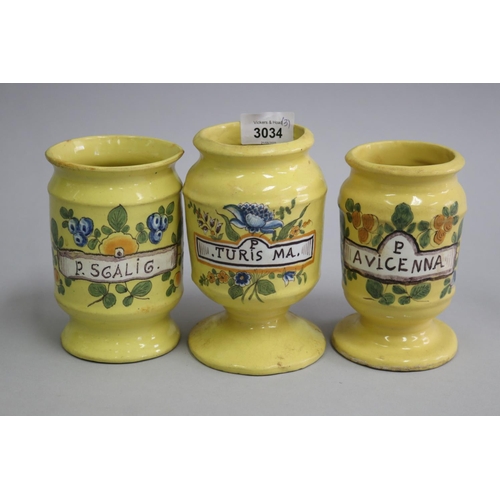 3034 - Three yellow glazed terracotta jars , P AVICENNA, P TURIS MA and P. SCALIG, approx 15cm H and shorte... 