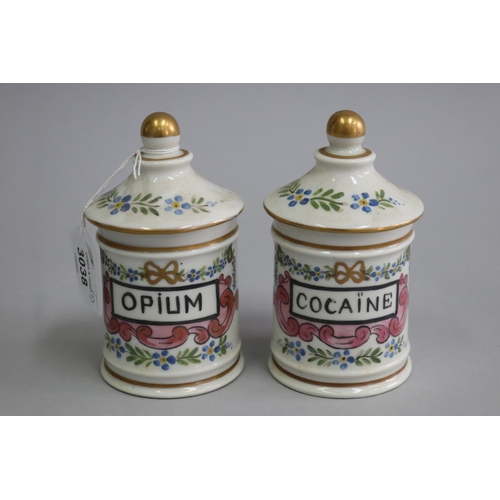 3038 - Two lidded Apothecary jars- OPIUM-COCAINE, marked Sevres, each approx 13cm H (2)