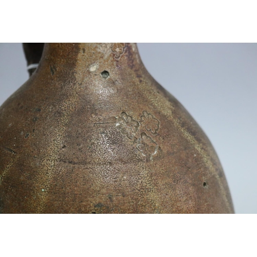 3091 - Antique Bellermine pottery with a floral decoration, approx 34cm H