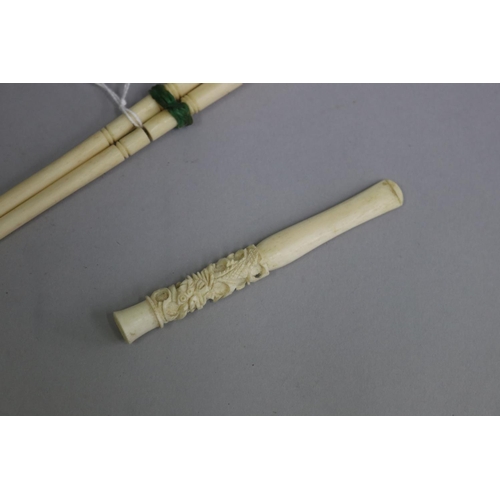 3120 - Pair of carved chopsticks and cheroot holder, approx 22cm L and shorter  (3)