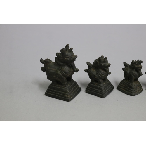 3131 - Six antique bronze opium weights, approx 7cm H and shorter (6)