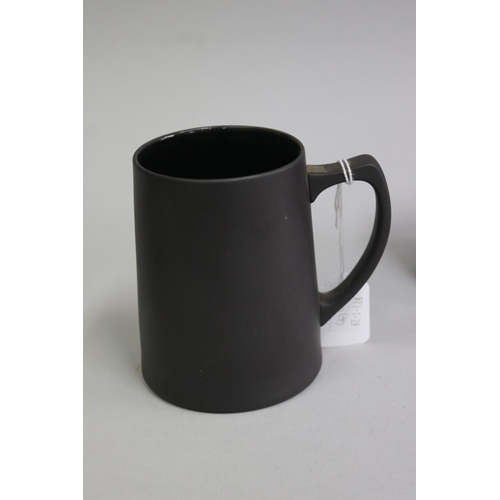 3140 - Two Wedgwood black basalt mugs, vase and small jug, approx 13cm H and shorter (4)