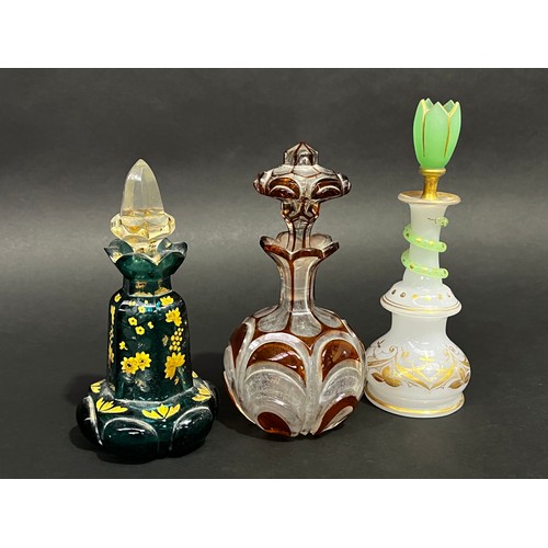 4 - Three antique glass perfume bottles, approx 22cm H and shorter (3)