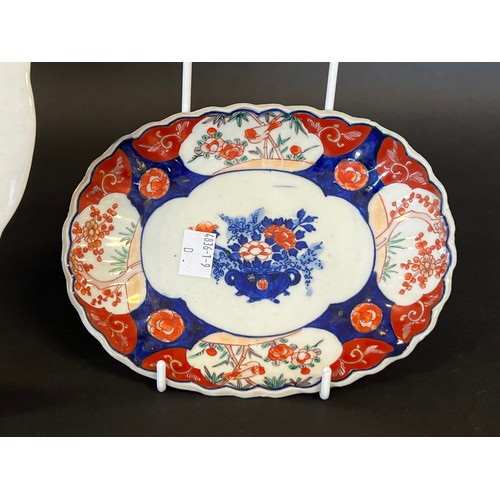 55 - Oriental polychrome enamel decorated plate, along with an Imari oval plate, approx 25cm Dia and smal... 