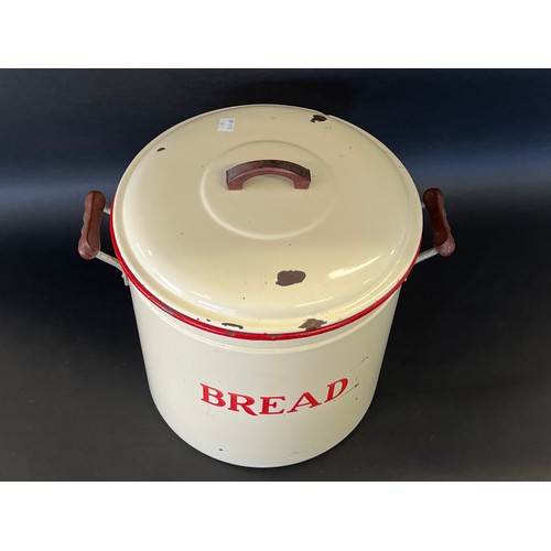 60 - Vintage red and cream enamel twin handled bread bin, approx 36cm H x 32cm Dia