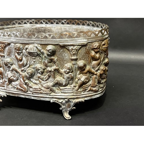 1 - Antique repousse copper jardiniere with continuous band of putti with tin liner, approx 19cm H x 34c... 