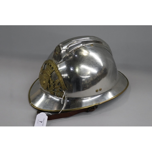 7 - Good quality chromed metal and leather French fireman's helmet, with chin strap and inner lining, Se... 