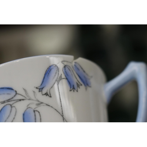 123 - Assortment of porcelain, part Heathcote china and pottery mugs etc