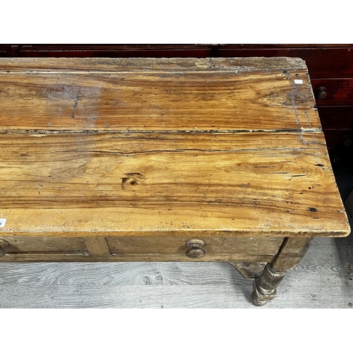 1034 - Antique rustic pine three drawer dresser, with shaped pot board base, standing on turned legs, appro... 