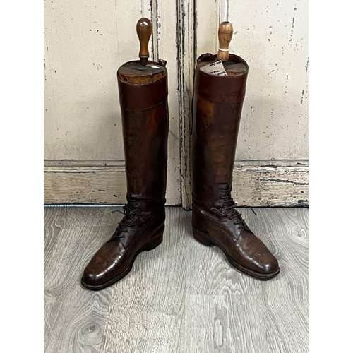 1051 - Pair of old French leather boots with stretchers, approx 67cm H (2)