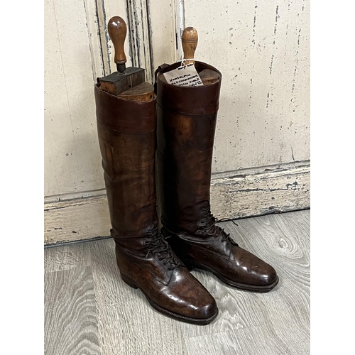 1051 - Pair of old French leather boots with stretchers, approx 67cm H (2)