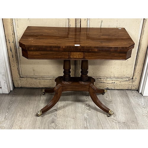 1054 - Fine antique restored English Regency period fold over card table, canted top over a double turned f... 