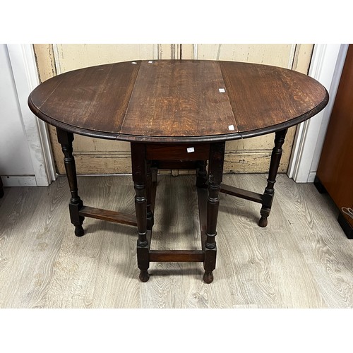 1041 - English Oak Gate leg table, approx 72cm H x 120cm W (open) and approx 42cm W (closed)