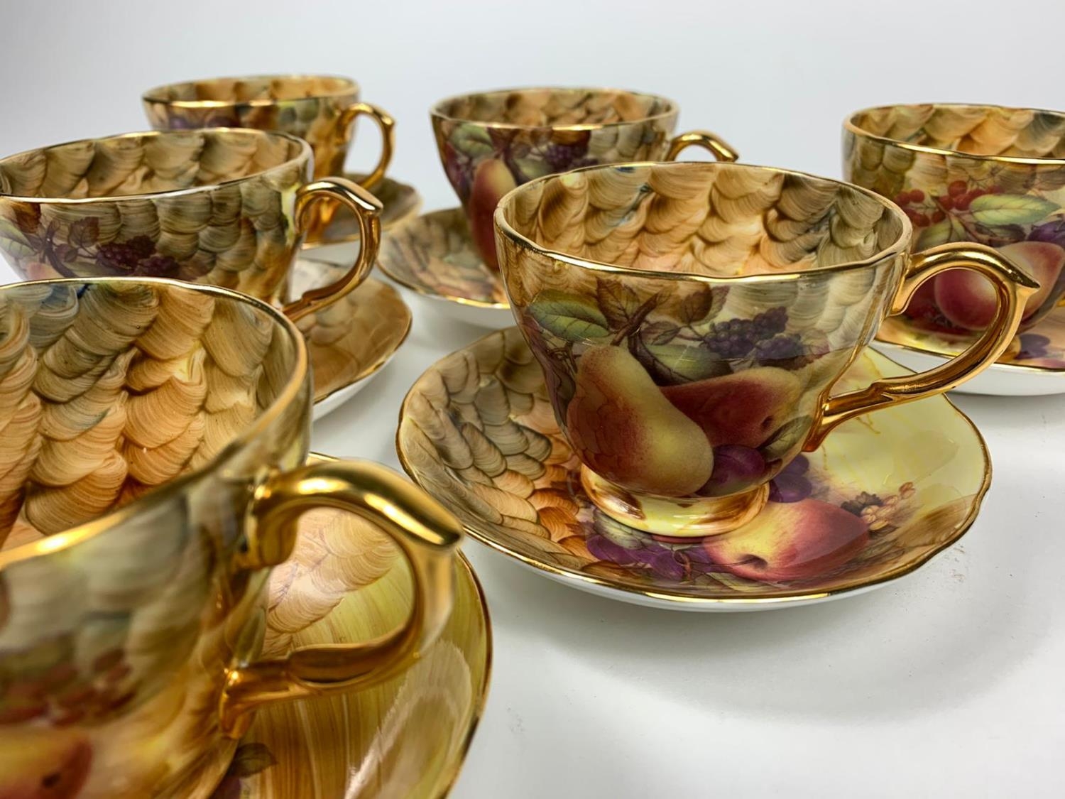 Set of 6 hand painted decorative cups and saucers