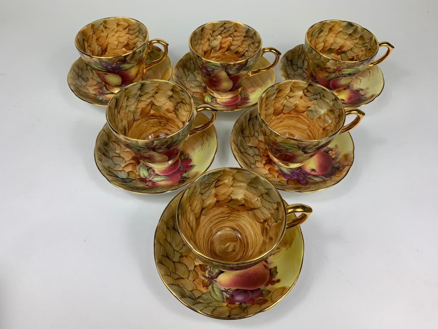 Set of 6 hand painted decorative cups and saucers