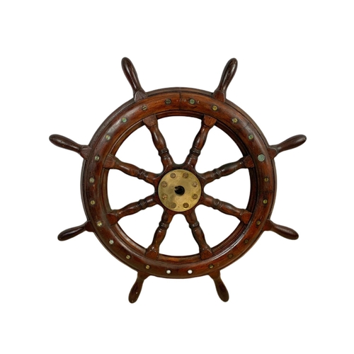 19 - Edwardian mahogany and brass ships wheel. 81cm