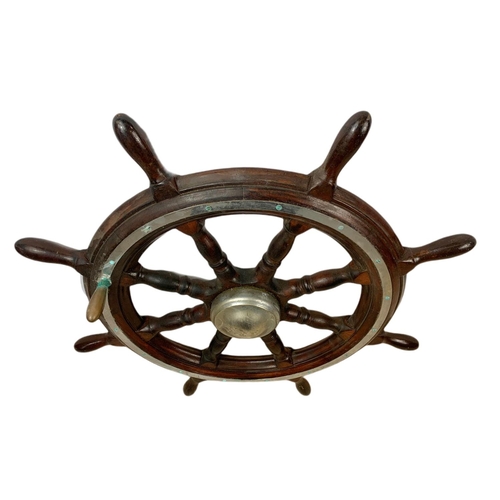 19 - Edwardian mahogany and brass ships wheel. 81cm