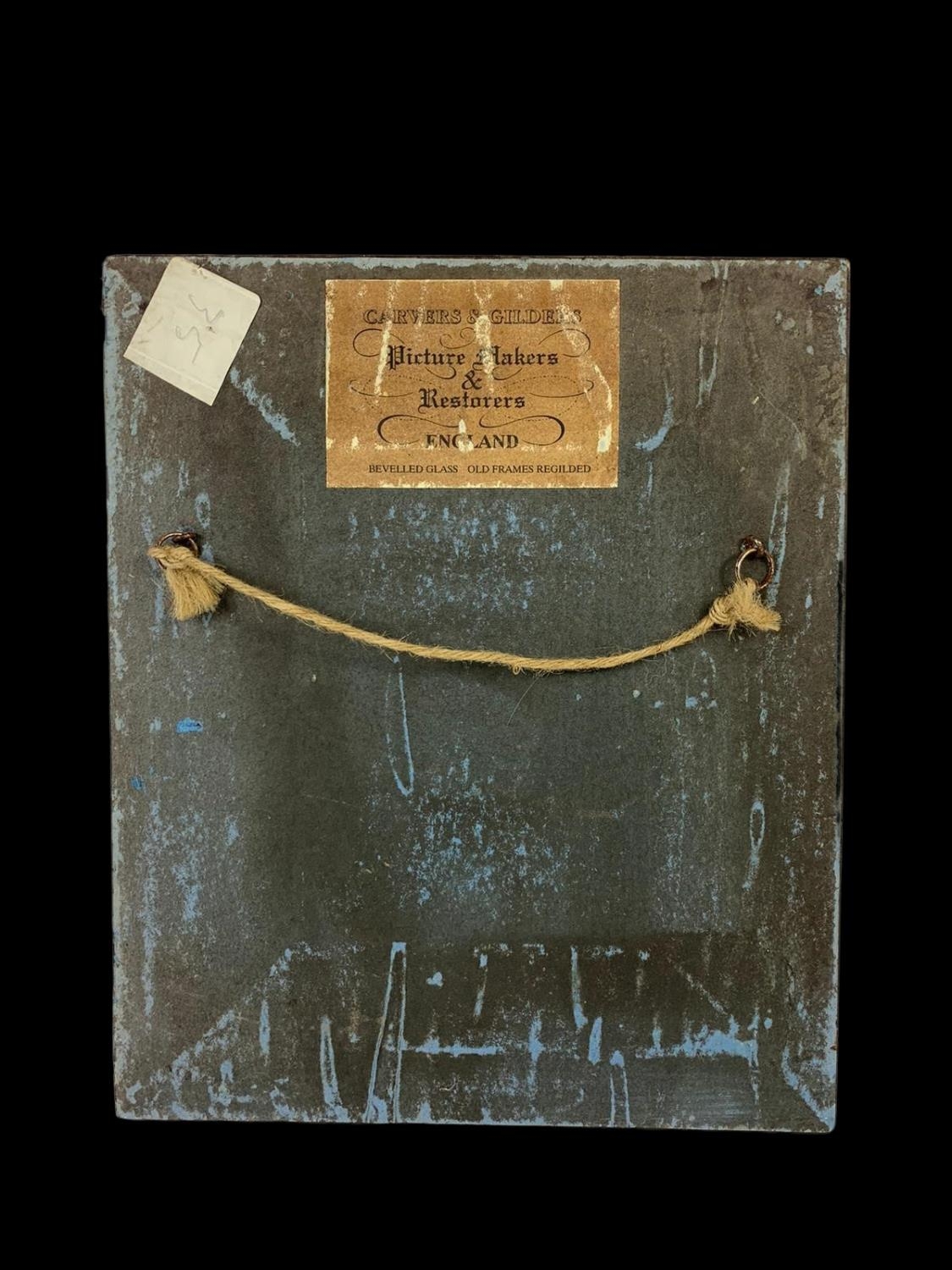 An ornate gilt framed print. Frame from Carvers & Gilders Picture